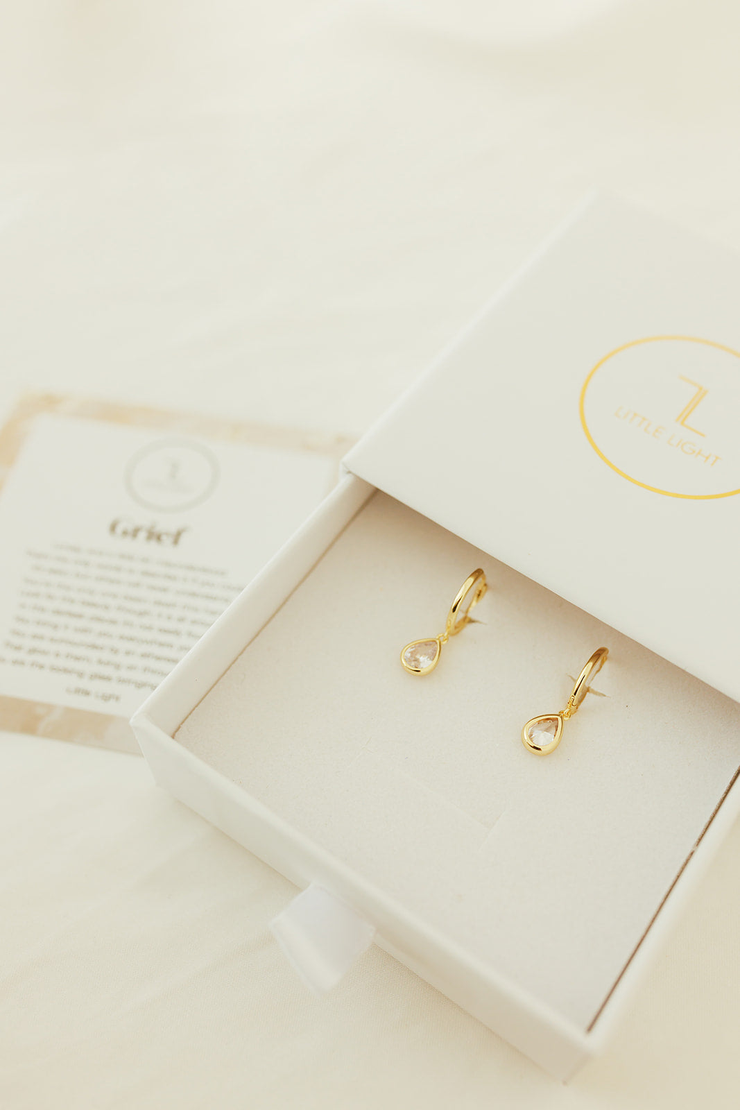 GRIEF EARRINGS